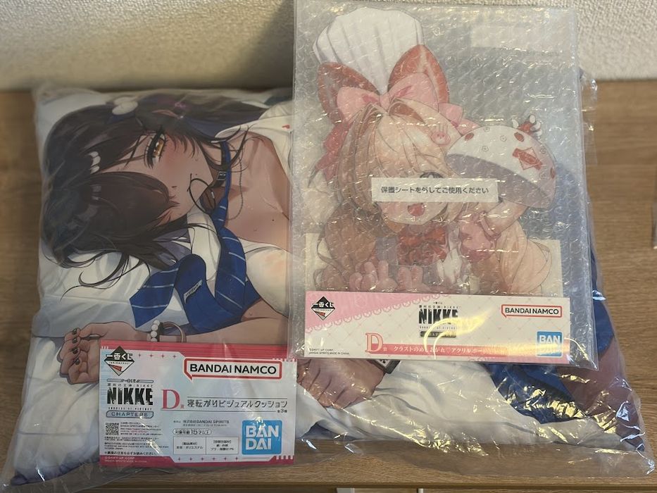 NIKKEの一番くじグッズクッションとアクスタ